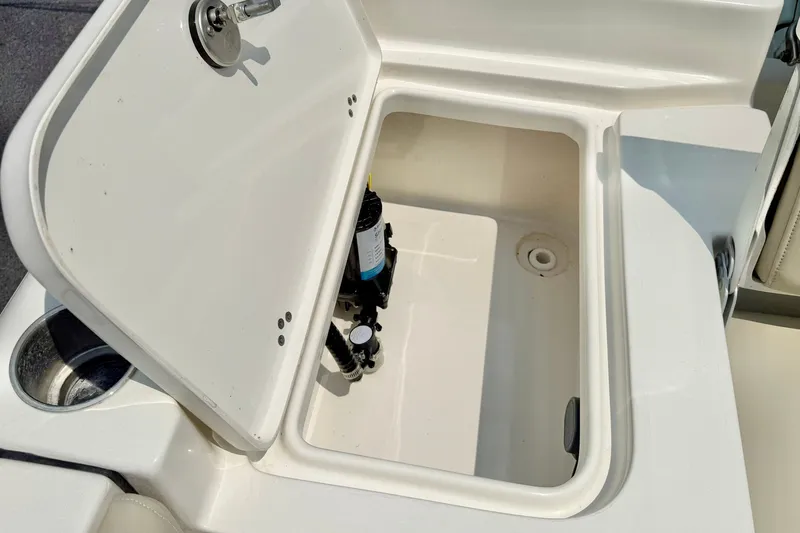 Slide: The Image of Open storage compartment on 2025 Key West 188 Bay Reef boat. - 27