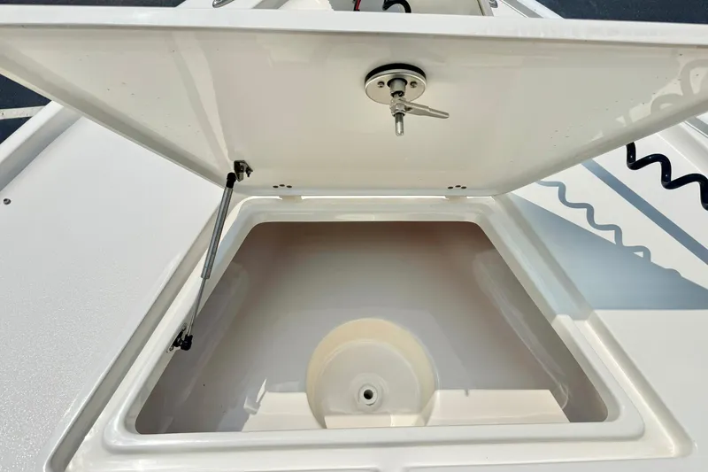Slide: The Image of Open storage compartment on 2025 Key West 188 Bay Reef boat. - 14