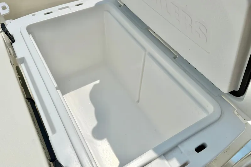 Slide: The Image of Open storage compartment on 2025 Key West 188 Bay Reef boat, showcasing spacious interior. - 24