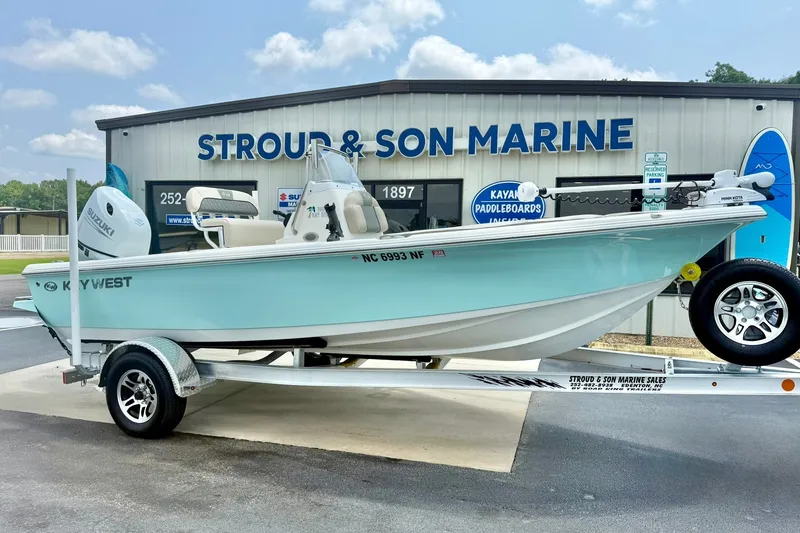 Slide: The Image of 2025 Key West 188 Bay Reef boat on trailer at Stroud & Son Marine dealership. - 6