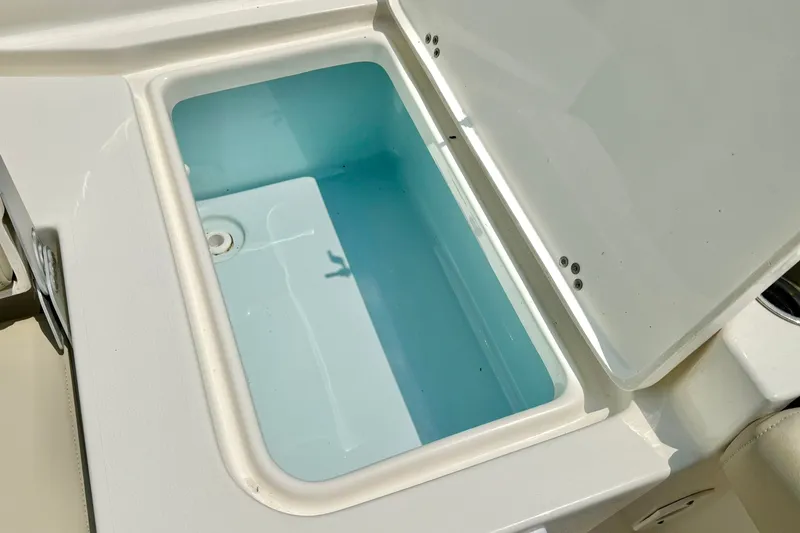 Slide: The Image of Open storage compartment on 2025 Key West 188 Bay Reef boat, showcasing interior space. - 28