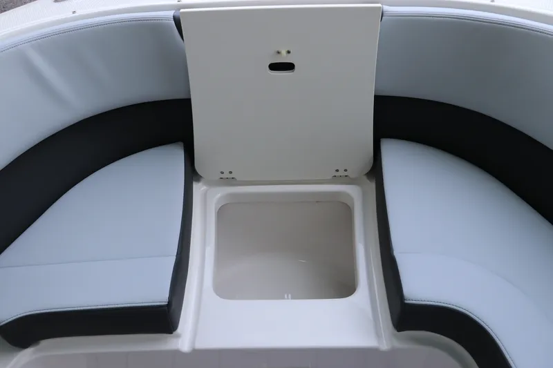 Slide: The Image of 2026 Chaparral 280 OSX boat seating with storage compartment, featuring sleek design and modern upholstery. - 41