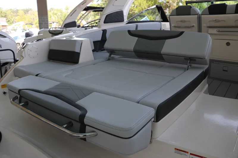 Slide: The Image of 2026 Chaparral 280 OSX boat interior with luxurious seating and modern design. - 9
