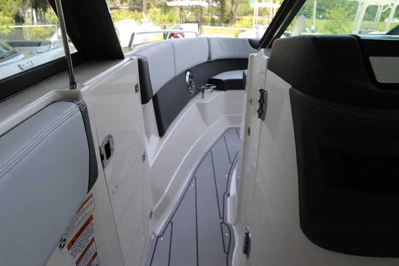 Slide: The Image of Interior view of 2026 Chaparral 280 OSX boat, featuring sleek seating and modern design. - 34