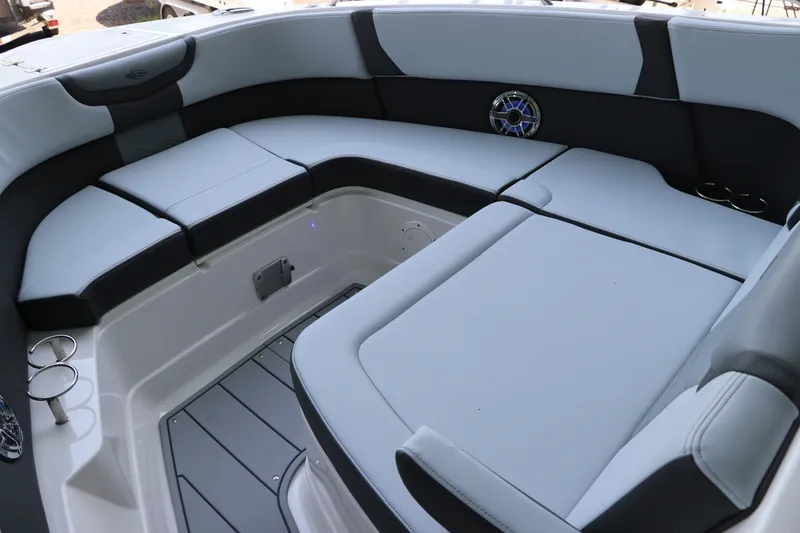 Slide: The Image of 2026 Chaparral 280 OSX boat interior with sleek seating and modern design. - 36