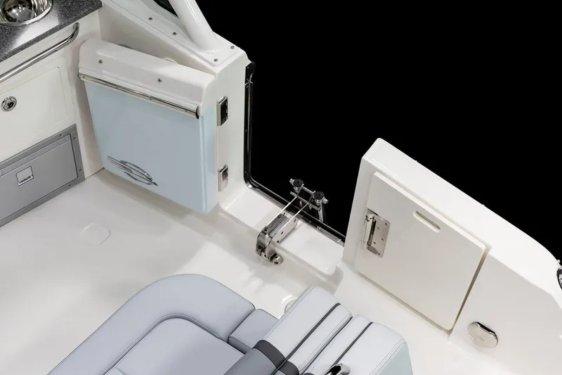 Slide: The Image of Manufacturer Provided Image: 2025 Chaparral 280 OSX boat interior, featuring sleek seating and storage compartments. - 6