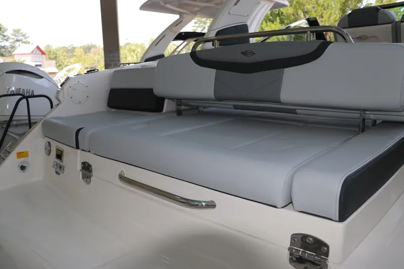 Slide: The Image of 2026 Chaparral 280 OSX boat interior with sleek seating and modern design. - 7