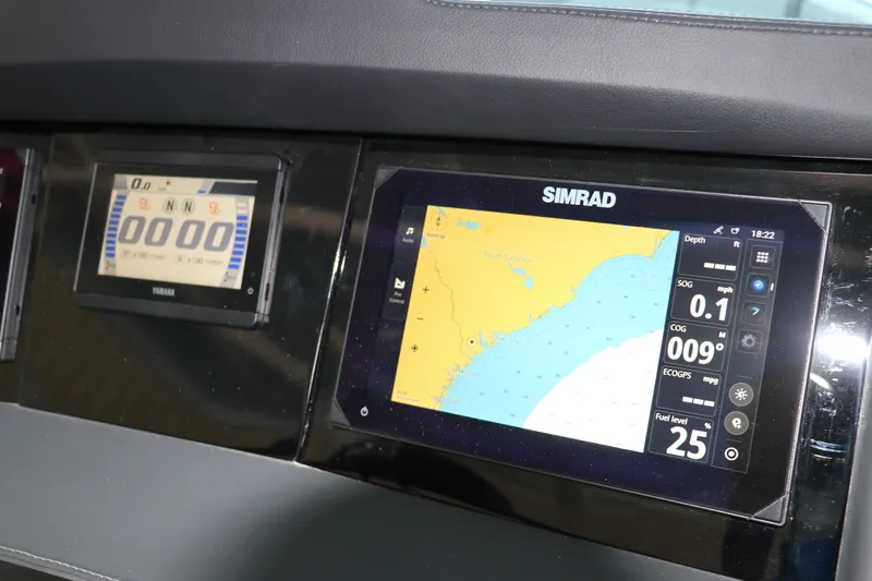 Slide: The Image of Dashboard of 2026 Chaparral 280 OSX with Simrad navigation display. - 26
