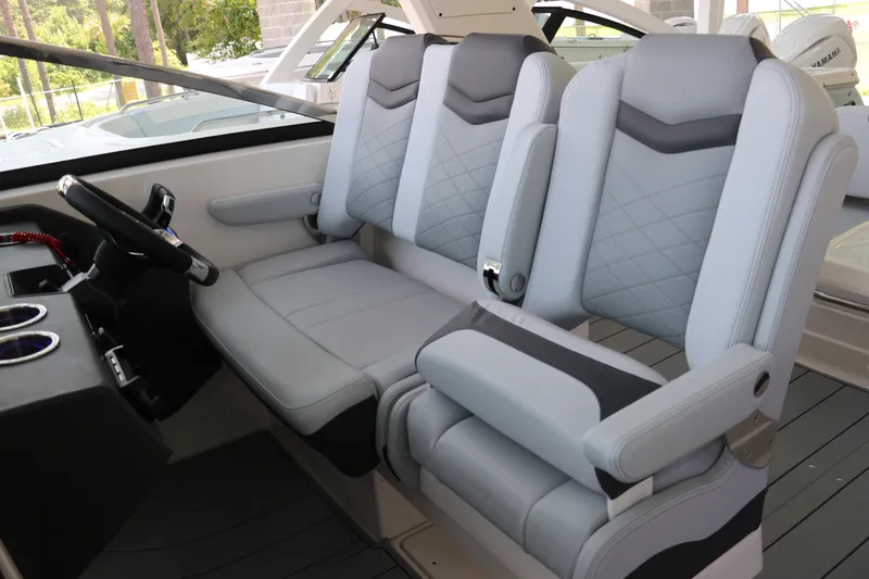 Slide: The Image of Luxury seating in the 2026 Chaparral 280 OSX boat cockpit, featuring modern design and comfort. - 21