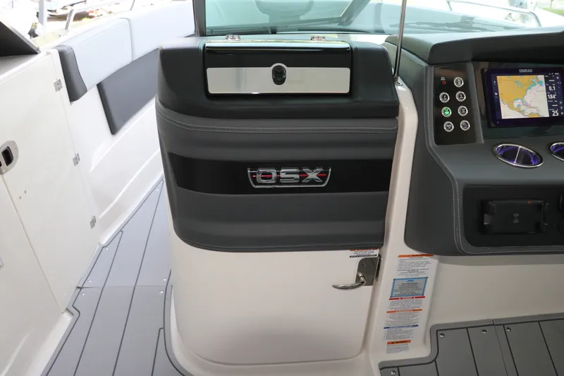 Slide: The Image of 2026 Chaparral 280 OSX boat interior with navigation controls and sleek design. - 30