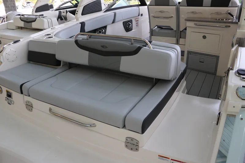 Slide: The Image of 2026 Chaparral 280 OSX boat interior with luxurious seating and modern amenities. - 6
