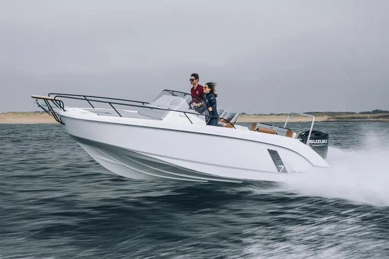 Slide: The Image of Manufacturer Provided Image: 2026 Beneteau Flyer 7 SUNdeck speeding on water with two passengers. - 1