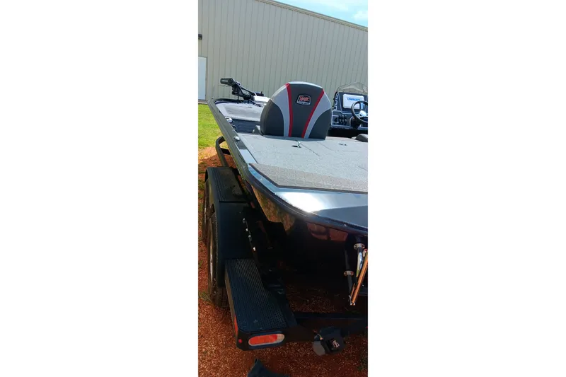 Slide: The Image of 2025 Ranger ALPHA 208 boat on trailer, featuring sleek design and modern seating. - 3