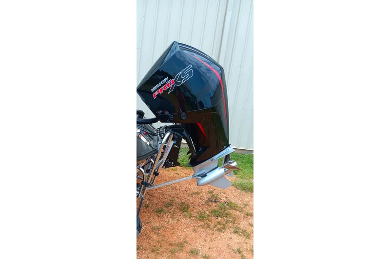 Slide: The Image of Outboard motor on a 2025 Ranger ALPHA 208 boat, featuring Mercury Pro XS branding. - 11