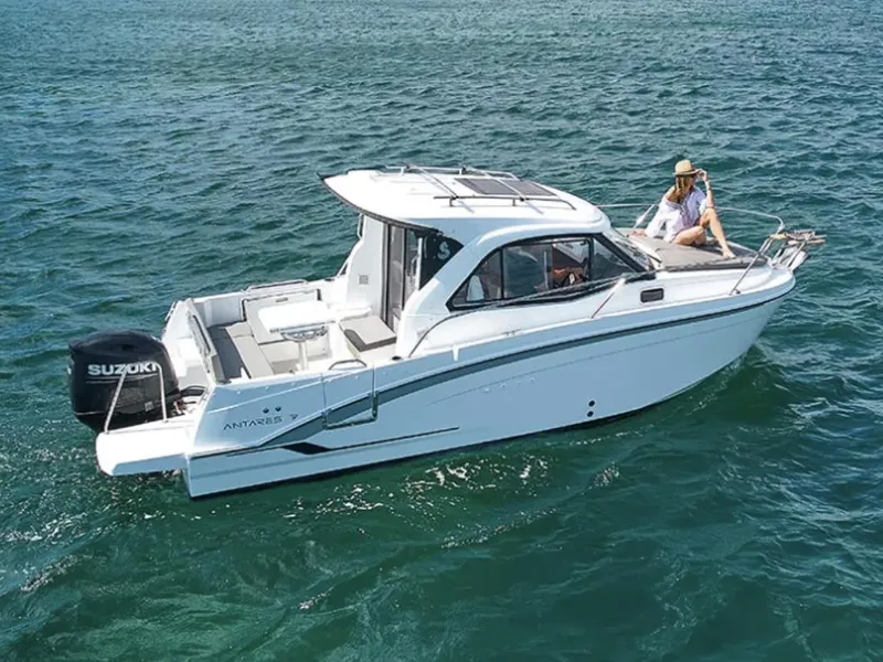 Slide: The Image of Manufacturer Provided Image: 2026 Beneteau Antares 7 boat cruising on open water with passengers onboard. - 3