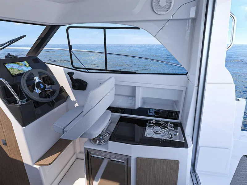 Slide: The Image of Manufacturer Provided Image: Interior of 2026 Beneteau Antares 7 boat with steering wheel and navigation system. - 6