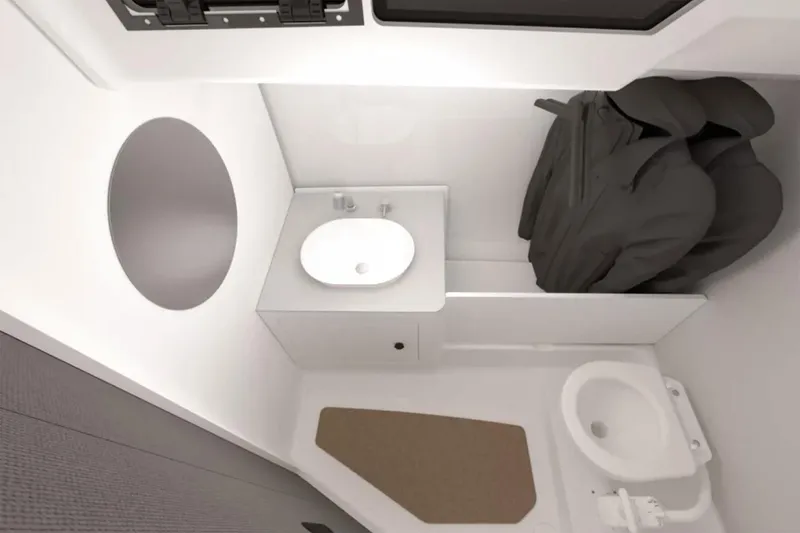 Slide: The Image of Manufacturer Provided Image: Interior of Beneteau First 30, 2026, featuring sink and storage area. - 7