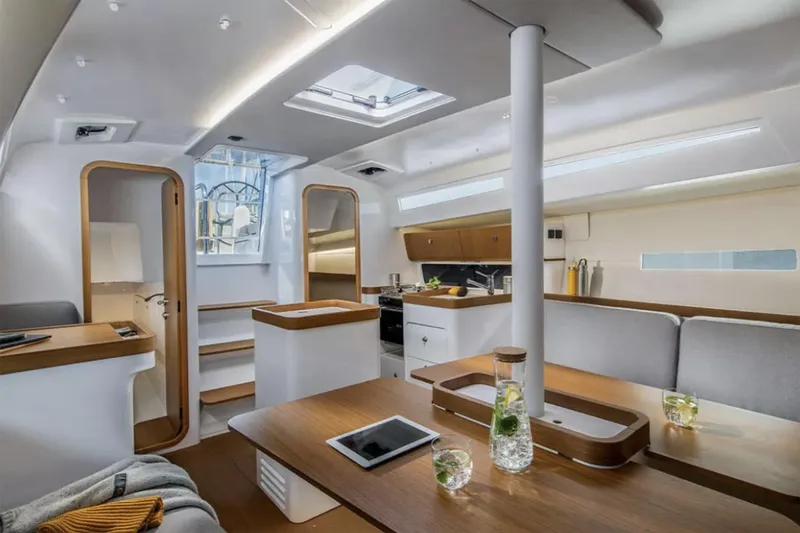 Slide: The Image of Manufacturer Provided Image: Modern interior of 2026 Beneteau First 36 sailboat with sleek design and cozy seating. - 4