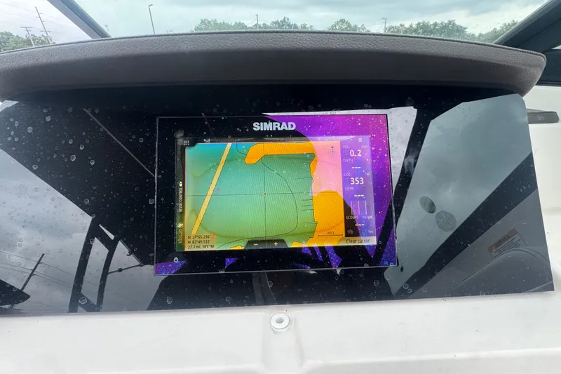 Slide: The Image of Simrad navigation system on a Sea Ray SPX 230 boat. - 31
