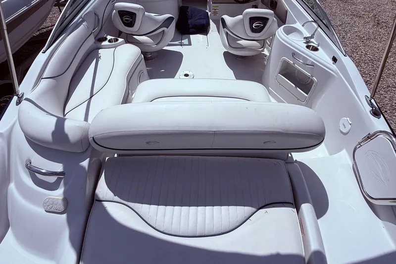 Slide: The Image of 2008 Crownline 220 EX boat interior with white seating and modern design. - 7