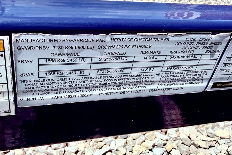 Slide: The Image of Label on a 2008 Crownline 220 EX trailer, detailing specifications and safety standards. - 15
