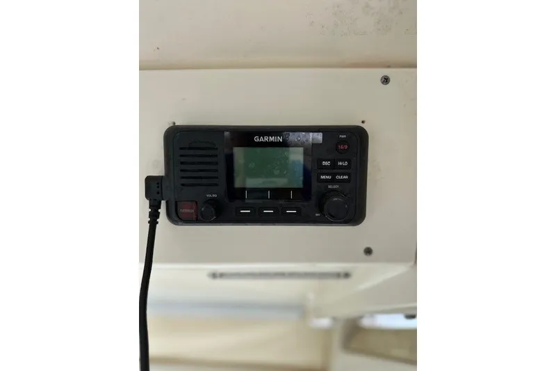 Slide: The Image of Garmin marine radio installed on a 2016 Scout 255 LXF boat dashboard. - 6