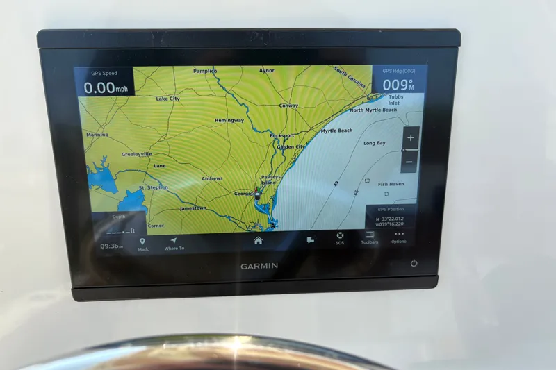 Slide: The Image of Garmin GPS display on 2027 Pioneer 202 Islander, showing South Carolina coastal map. - 23