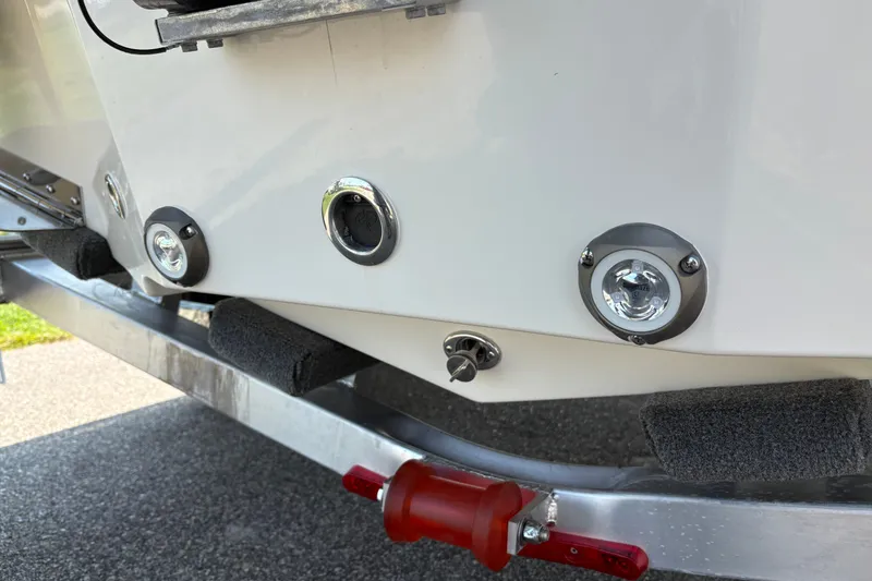 Slide: The Image of Rear view of 2027 Pioneer 202 Islander boat on trailer, showcasing lights and fittings. - 10