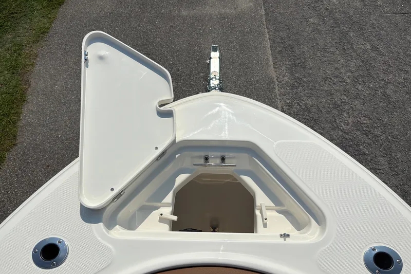 Slide: The Image of Open storage compartment on 2027 Pioneer 202 Islander boat, showcasing sleek design and functionality. - 32