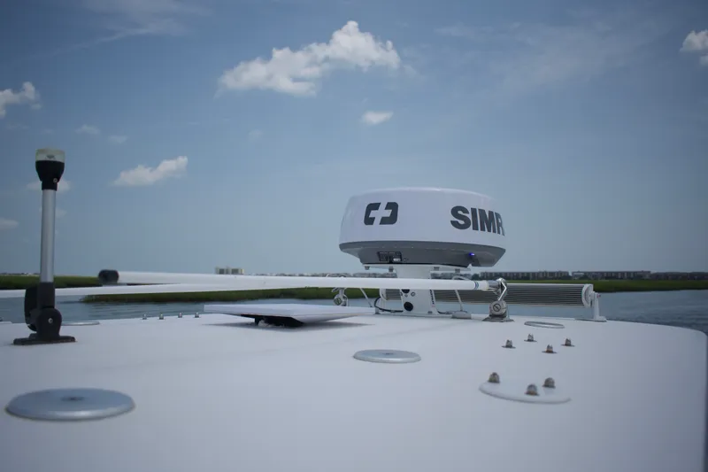 Slide: The Image of 2020 BlackJack 256 Coastal boat with Simrad radar system under a clear sky. - 19