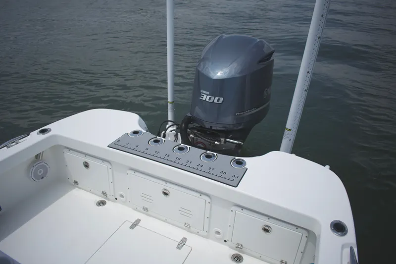 Slide: The Image of 2020 BlackJack 256 Coastal boat with Yamaha 300 outboard motor on water. - 23