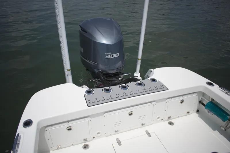 Slide: The Image of 2020 BlackJack 256 Coastal boat with Yamaha 300 outboard motor on calm water. - 21