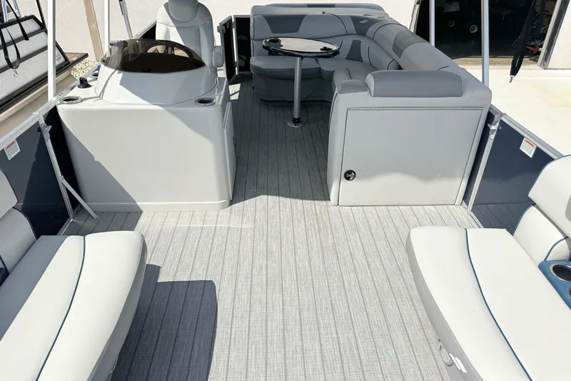 Slide: The Image of 2018 Starcraft Cruise 220 boat interior with spacious seating and modern design. - 4