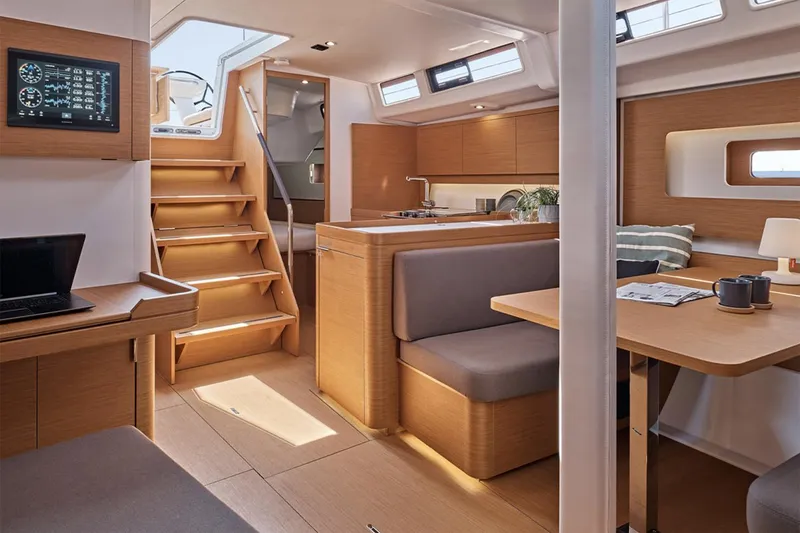Slide: The Image of Manufacturer Provided Image: Luxurious interior of 2026 Beneteau First 44 yacht with modern wood finish. - 4