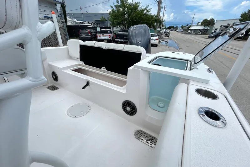 Slide: The Image of 2025 Sea Fox 228 Commander boat interior with storage compartments and seating. - 4