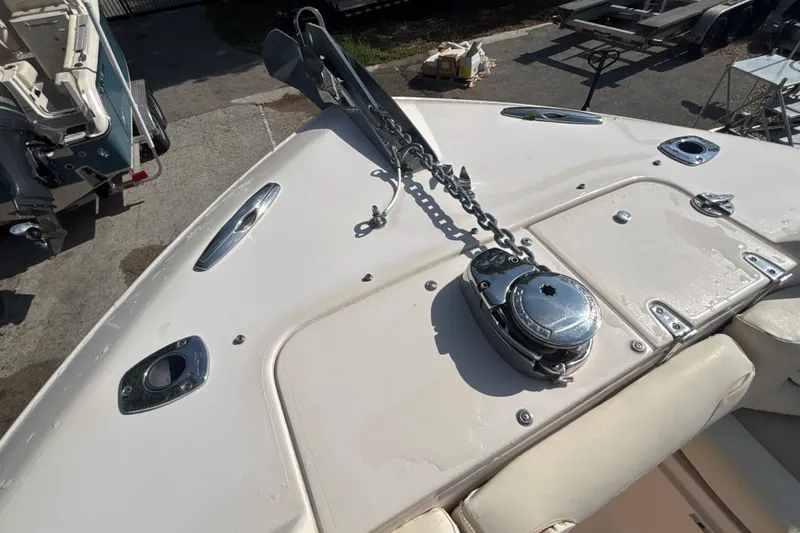 Slide: The Image of Bow view of 2008 Grady-White Freedom 275 boat with anchor and chain mechanism. - 16