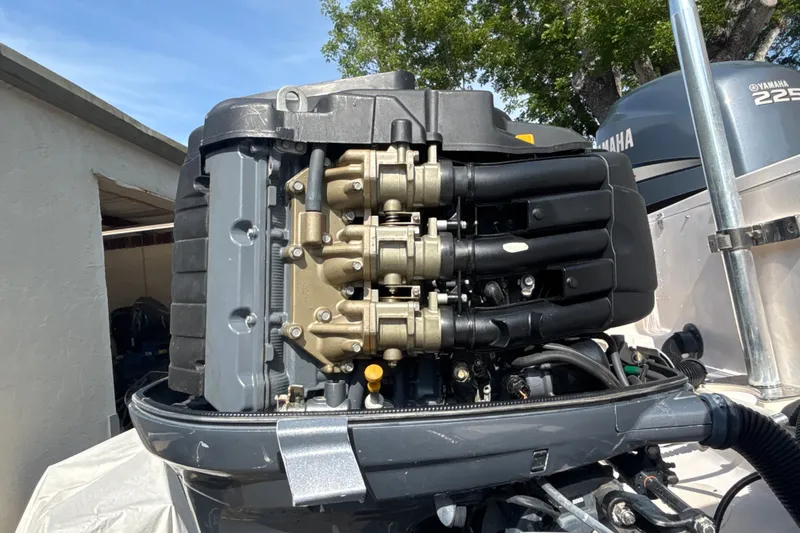 Slide: The Image of Close-up of a Yamaha 225 outboard motor on a 2008 Grady-White Freedom 275 boat. - 19