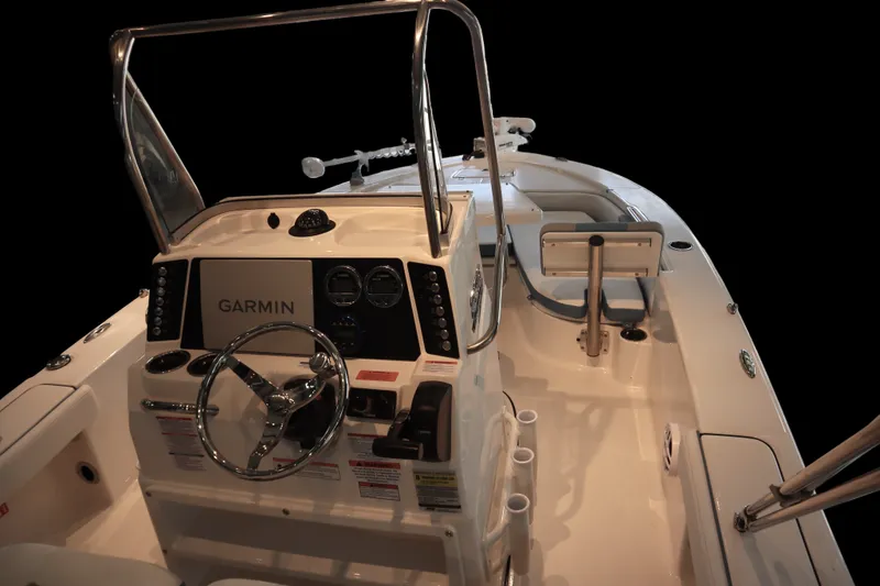 Slide: The Image of 2026 Robalo 226 Cayman boat interior with Garmin navigation system and sleek design. - 32