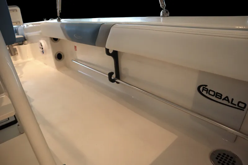 Slide: The Image of 2026 Robalo 226 Cayman boat interior with seating and branding. - 23
