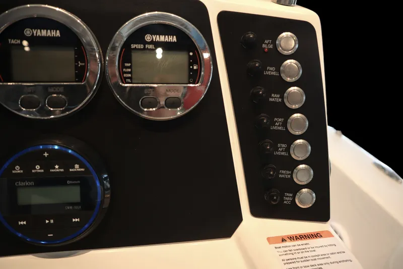 Slide: The Image of Dashboard of 2026 Robalo 226 Cayman boat with Yamaha gauges and control panel. - 18