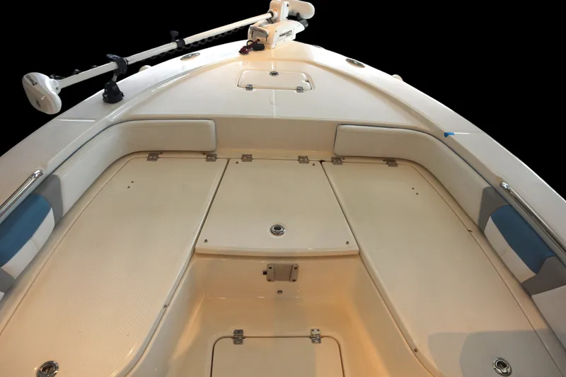 Slide: The Image of 2026 Robalo 226 Cayman boat deck with seating and storage compartments. - 5