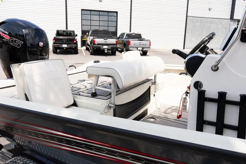 Slide: The Image of 2022 Ranger RB200 boat interior with seating and Mercury Pro XS engine. - 14