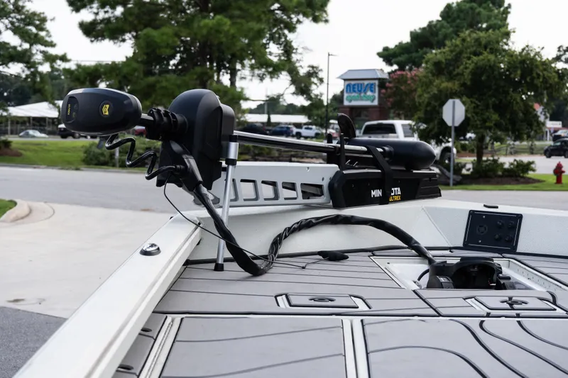 Slide: The Image of 2022 Ranger RB200 boat with Minn Kota Ultrex trolling motor in a parking lot. - 10