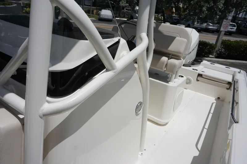 Slide: The Image of 2027 Boston Whaler 210 Montauk boat interior with seating and console details. - 33