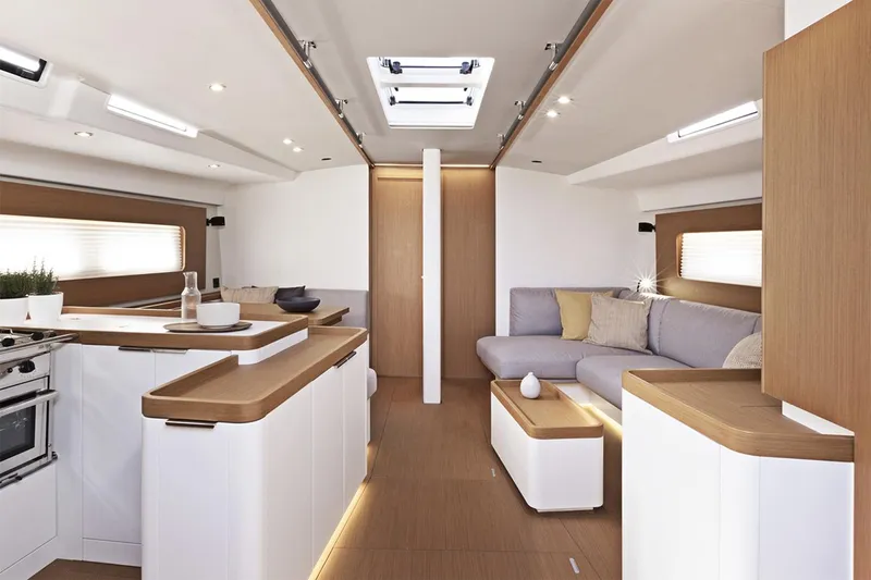 Slide: The Image of Manufacturer Provided Image: Luxurious interior of 2026 Beneteau First 53 yacht with modern kitchen and seating area. - 6