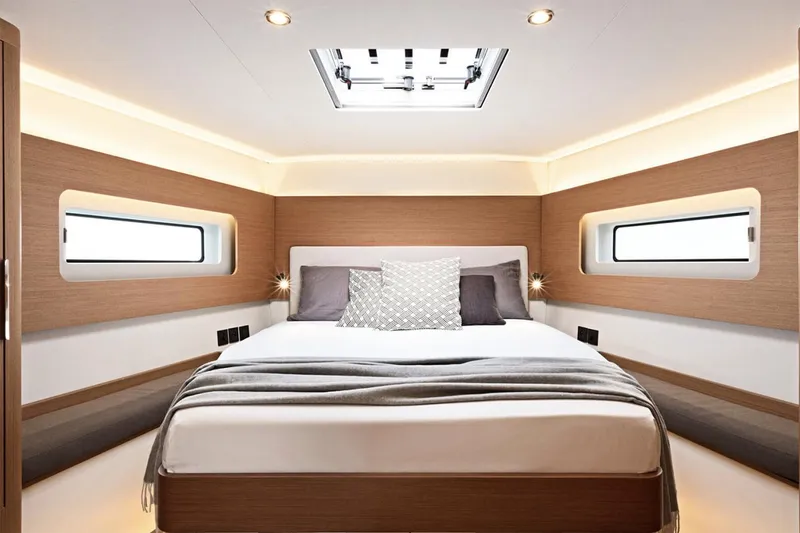 Slide: The Image of Manufacturer Provided Image: Luxurious cabin interior of 2026 Beneteau First 53 yacht with modern design. - 8