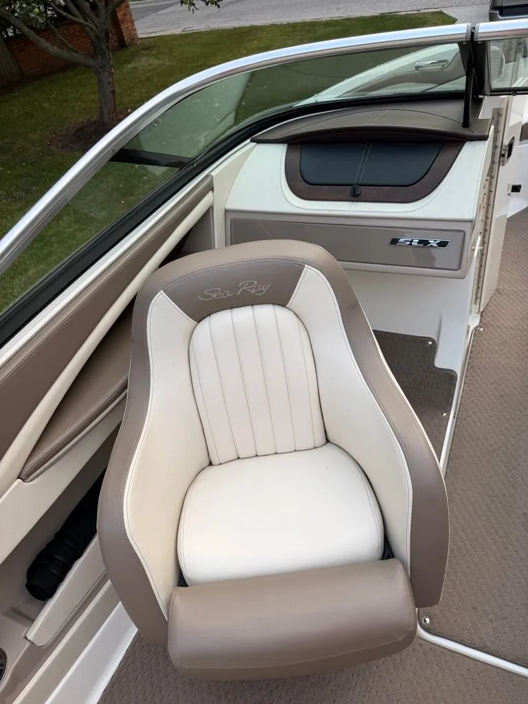 Slide: The Image of A stylish seat in the cockpit of a 2013 Sea Ray 210 SLX, featuring sleek design. - 6