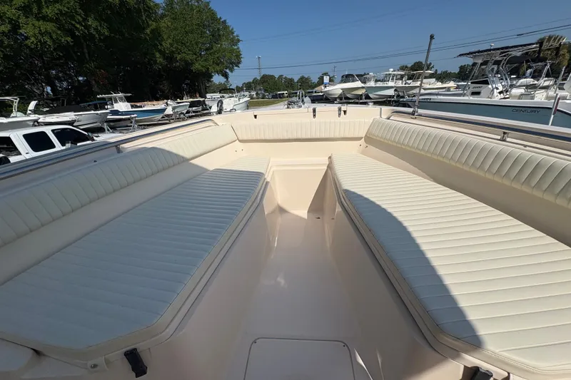 Slide: The Image of 2011 Grady-White Canyon 283 boat interior with spacious seating and sleek design. - 6