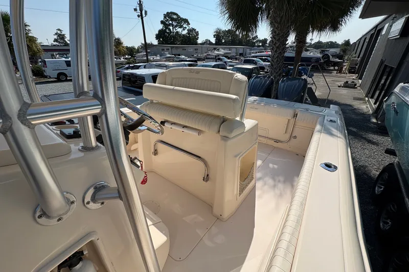 Slide: The Image of 2011 Grady-White Canyon 283 boat interior with helm and seating area. - 11