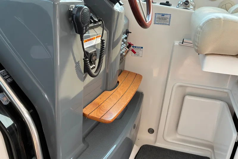 Slide: The Image of Interior view of 2007 Tiara 3900 Sovran boat helm with radio and controls. - 37